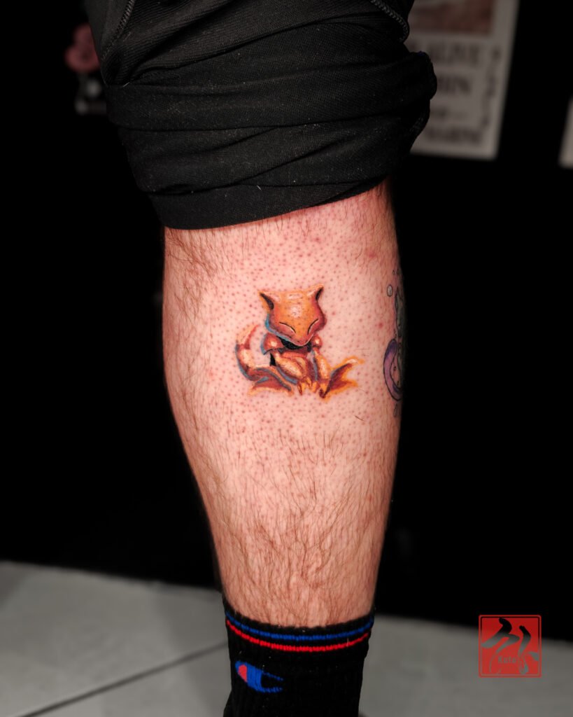 Pokémon Abra — tatouage par Kuto, tatoueur Paris / Levallois (Manga)
